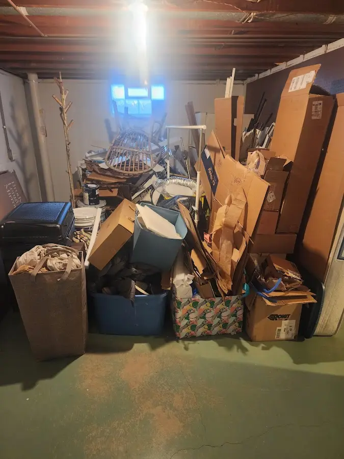 Roll-off dumpster container at job site for 2 Yard Dumpster Rental in Makakilo